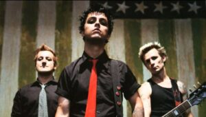 Respon Kocak AC Milan Balas Postingan Inter yang Memamerkan Vokalis Green Day Berikan Dukungan ke Mereka